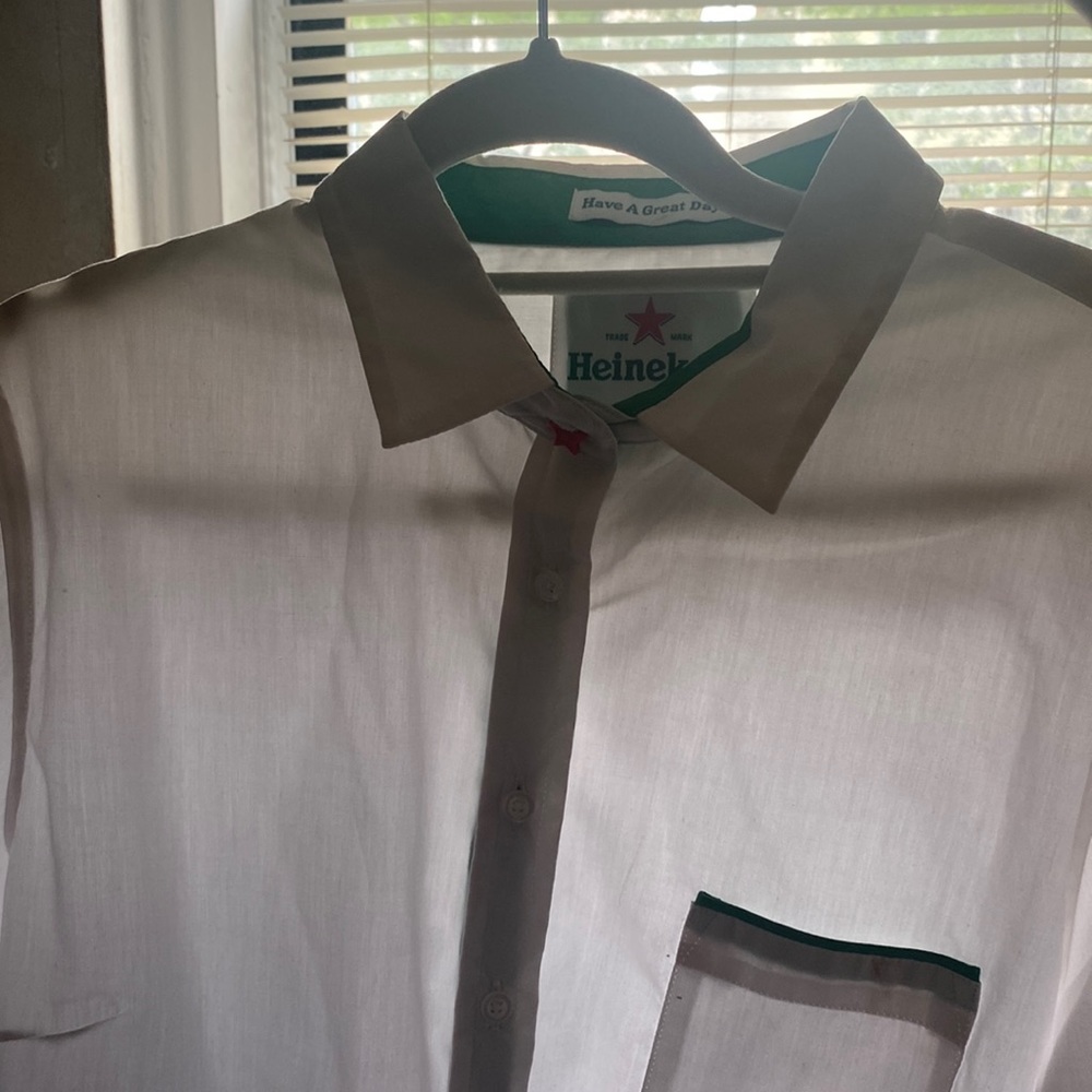 Large Heineken shirt.